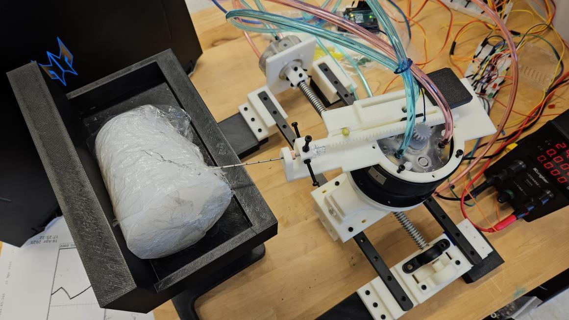Needle insertion validation test on silicone block showing less than 2mm depth accuracy